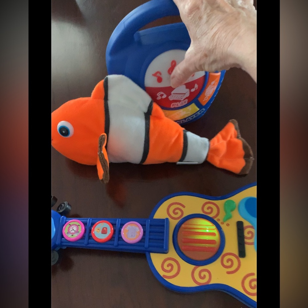 Musical toys and Nemo fish lot
